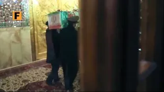 بردن شهیدمحسن فخری زاده به حرم امام رضا(ع)