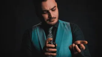 دانلود آهنگ جدید کامران مولایی به نام عطر